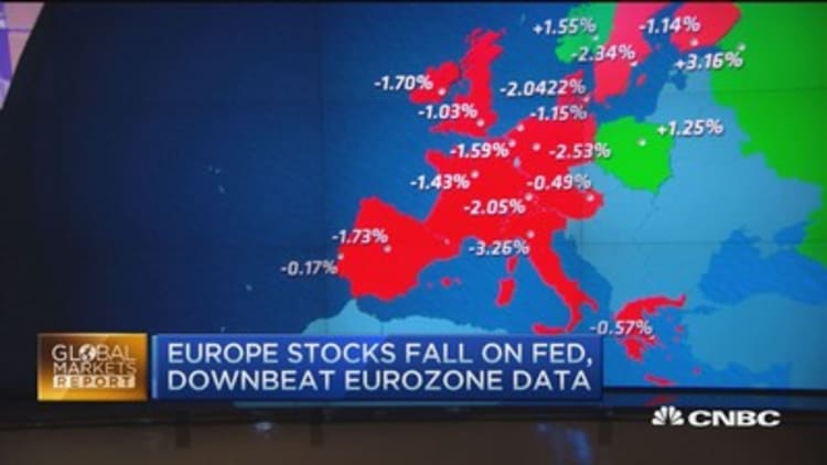 European markets fall on Fed, downbeat data
