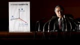 Bank of Japan (BOJ) Governor Haruhiko Kuroda speaks next to a panel to explain his policy during a news conference at the BOJ headquarters in Tokyo, Japan, January 29, 2016.