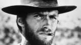Clint Eastwood squints while smoking a cigarette between his teeth in a still from director Sergio Leone's film 'The Good, The Bad, and The Ugly.'