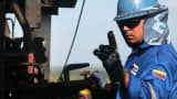 An oil worker on a drilling rig in the Orinoco Belt near San Diego de Cabrutitas, 300 miles from Caracas, Venezuela.