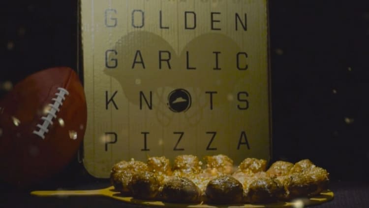 Get a gold-covered pizza from Pizza Hut