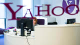 An employee works at her desk inside the office at the Yahoo Inc. headquarters.