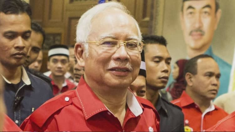Malaysian PM Najib Razak's brother warns of 1MDB scandal fallout