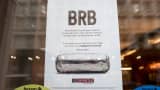 A sign sits in the window of a Chipotle restaurant on Broadway in Lower Manhattan telling customers the restaurant is closed until 3 p.m. on February 8, 2016 in New York City.
