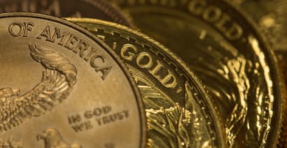 Gold eases before US jobs data and as equities gain