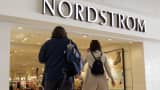 Shoppers enter the Nordstrom store April 1, 2003 on Michigan Avenue in Chicago.