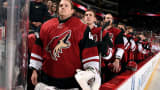 Goalie Nathan Schoenfeld #40 of the Arizona Coyotes stands for the national anthem before the start of a game against the Montreal Canadiens at Gila River Arena on February 15, 2016 in Glendale, Arizona. Schoenfeld was an emergency call up after back-up goalie Anders Lindback was injured on Monday before the game.