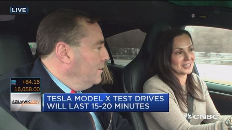 LeBeau gets a ride in the Tesla Model X