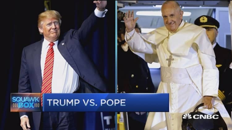 Holy war buzz: Trump v. Pope