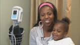 Fantasia James-Hollins and 3-year-old daughter Antalisa at the Dimock Health Center in Roxbury, Mass.