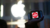 A protestor holds up an iPhone that reads, 'No Entry' outside of an Apple store in New York City on February 23, 2016.