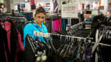 A shopper browses clothing at a JC Penney store in Queens, New York.