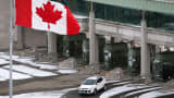 A vehicle makes its way through the Canadian border crossing in Niagara Falls, Ontario, Canada.