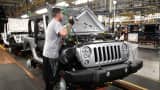 A worker assembles a Jeep Wrangler at the Chrysler Toledo North Assembly Plant in Toledo, Ohio.