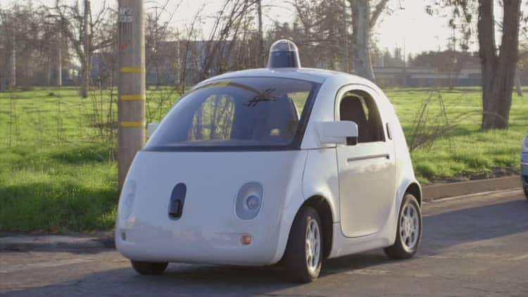 Google doubles down on car team