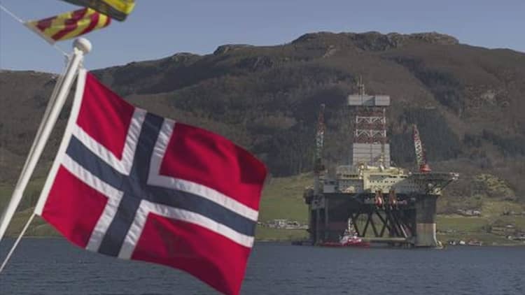 Norway taps oil fund for the first time