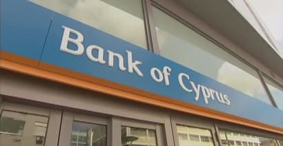 Cyprus exits bailout with cash to spare