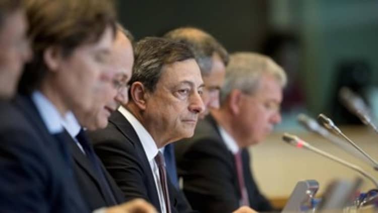 ECB cuts interest rates and expands asset purchases