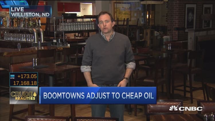 Boomtowns adjust to cheap oil