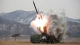 A new multiple launch rocket system is test fired in this undated photo released by North Korea's Korean Central News Agency (KCNA) in Pyongyang March 4, 2016.