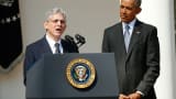 U.S. President Barack Obama listens to Judge Merrick Garland (L) of the United States Court of Appeals after announcing his nominee for the U.S. Supreme Court in the Rose Garden of the White House in Washington March 16, 2016.
