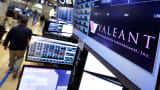 A trading post on the floor of the New York Stock Exchange displays the Valeant Pharmaceuticals logo, March 15, 2016.