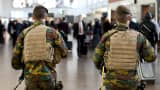 Military police patrol the Brussels Airport on November 18, 2015 in Zaventem, eastern Brussels. Belgium's national security level has been raised to three, following a series of coordinated attacks by Islamic State jihadists in Paris on November 13, 2015.
