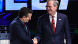 Republican presidential candidate Texas Sen. Ted Cruz (L) shakes hands with former Gov. Florida Jeb Bush in December 2015.