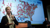 Activist Erin Brockovich uses a computer model to display the growing environmental hot spots as she speaks during an Oklahoma Earthquake Town Hall Meeting at the University of Central Oklahoma February 23, 2016.