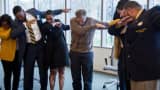 A tweet showing Bill Gates dabbing with students.