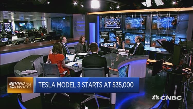 Tesla debuts the Model 3 electric car