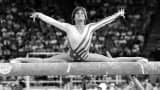 In this Aug. 3, 1984, file photo, Mary Lou Retton, of the United States, performs on the balance beam during the women's gymnastics individual all-around finals at the XXIII Summer Olympic Games in Los Angeles.