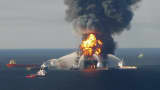 Fire boat response crews battle the blazing remnants of the offshore oil rig Deepwater Horizon, off Louisiana, in this April 21, 2010