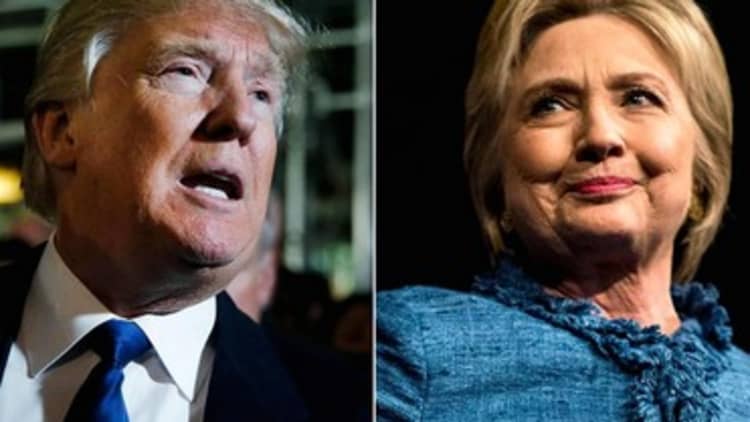 Trump, Clinton trail as Wisconsin voters head to polls