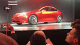 A Tesla Model 3 sedan, its first car aimed at the mass market, is displayed during its launch in Hawthorne, California.