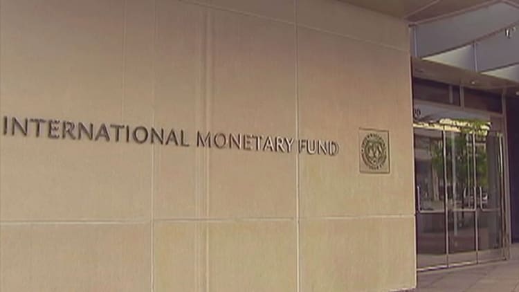 IMF slashes global growth again