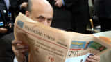 Businessman reading "Financial Times"