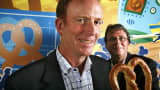 Bill Phelps, left, and Rick Wetzel, the co-founders of the Wetzel's Pretzel's bakery chain.