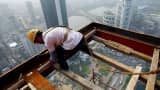 A Chinese construction worker at a skyscraper building site in Wuhan, central China's Hubei province.