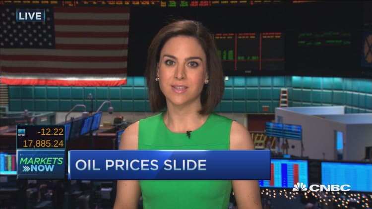 Oil slides after no deal in Doha