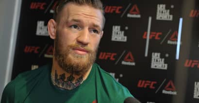 UFC star Conor McGregor turns himself into police after a melee in Brooklyn
