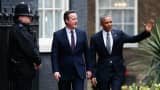 President Barack Obama waves as he is greeted by Britain's Prime Minister David Cameron (C) at Number 10 Downing Street in London, Britain April 22, 2016.