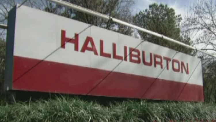 Halliburton cut jobs, delays earnings call