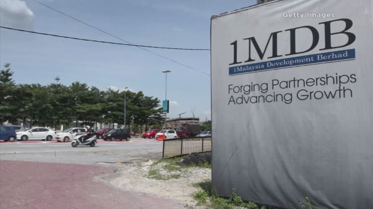 1MDB says some bonds are now in default