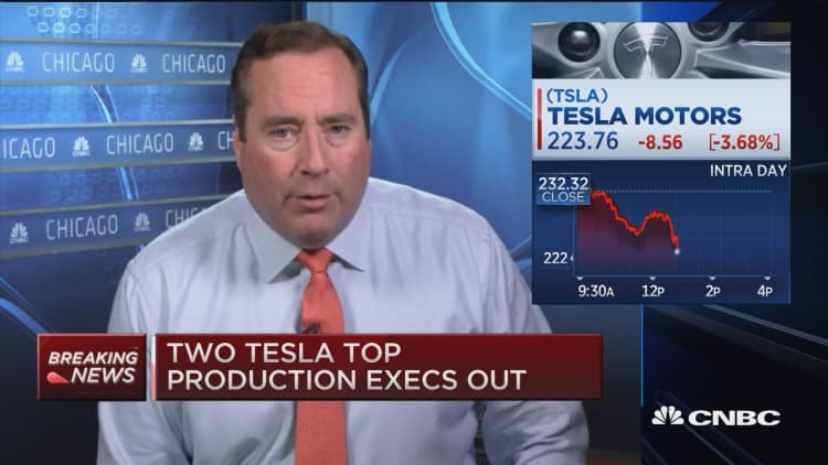 Two Tesla top production execs out