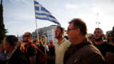 Protesters shout slogans during a demonstration outside the parliament building in central Athens, Greece where lawmakers were discussing controversial tax and pension reforms May 8, 2016.