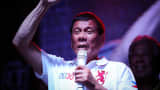 Philippine presidential candidate Rodrigo Duterte gestures during a labor day campaign rally on May 1, 2016 in Manila, Philippines.
