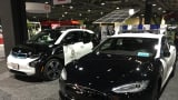 L.A. Police Department’s BMW i3 and Tesla Model S cars on display at recent trade show.