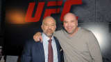 Lorenzo Fertitta (L) and Dana White (R) at a 2014 event. Both are major stakeholders in UFC's parent company, Zuffa.