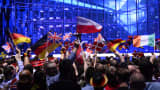 Supporters wave flags ahead of the Eurovision Song Contest 2014 Grand Final.